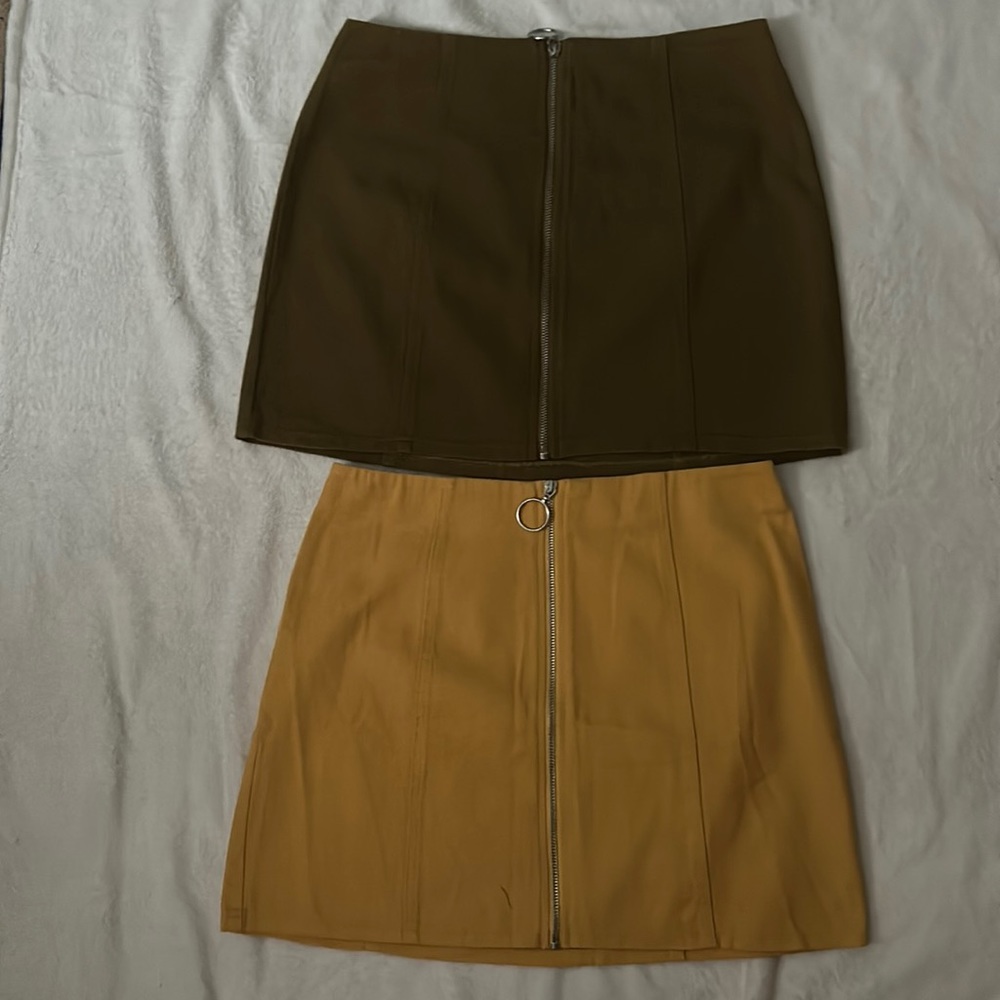 2x Jean skirt with a zipper down the middle, women’s large, ones yellow + green
